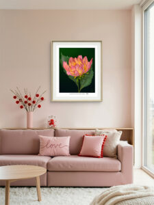 Summer Garden Dahlia, multi-color dahlia bloom with two dark green leaves on a dark green background displayed framed on a living room wall.